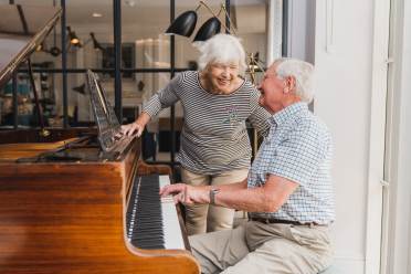 Owners playing the piano at a retirement village