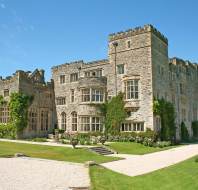 Stone manor house under a blue sky
