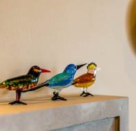 Colourful glass bird decorations 