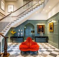Panelled entrance hall with grand staircase