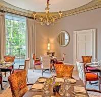 Restaurant with picture windows and tables set