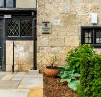 Close up of the side entrance into a stone building
