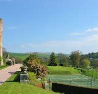 Stone walls and tennis court