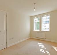 Bedroom with white walls