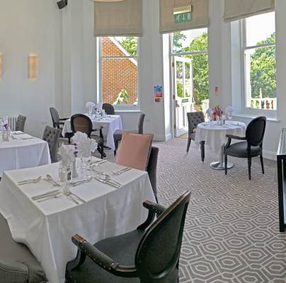 Restaurant tables set for lunch