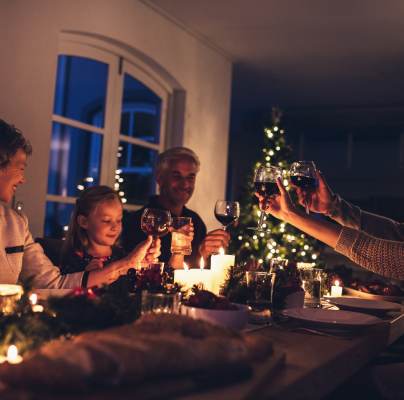 Family generations around the table at Christmas time