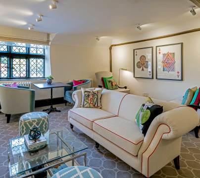 Lounge with low ceilings and cream furniture