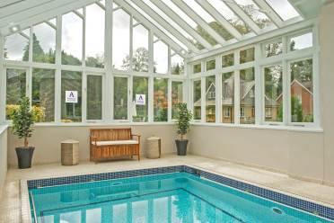 Swimming pool at Audley Willicombe Park, Tunbridge Wells Swimming pool in glazed building