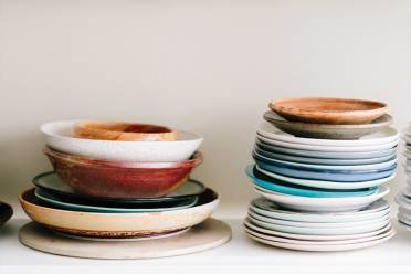 Plates and bowls in a range of colours Colourful plates and bowls