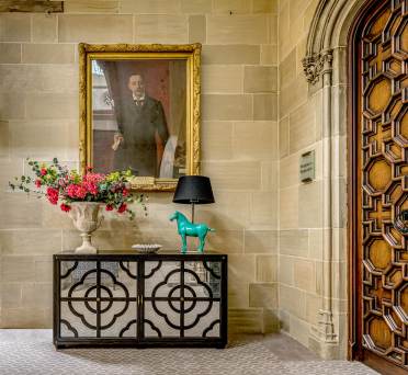 Framed portrait and side table