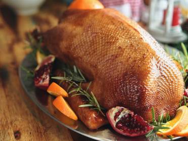 Perfectly cooked goose with trimmings